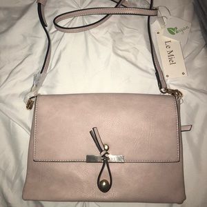 New with tags blush pink cross body bag. Le Miel
